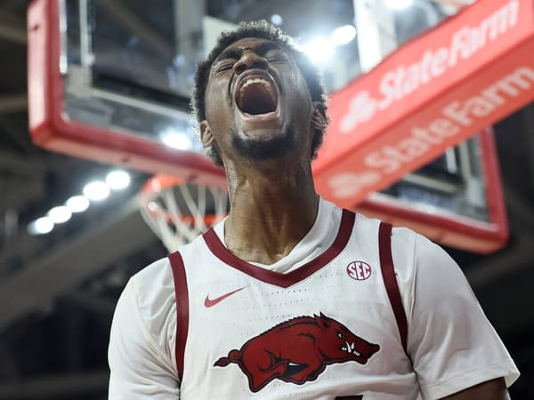 In a Statement Win, Arkansas Topples Sixth Ranked Louisville Before a Roaring Home Crowd